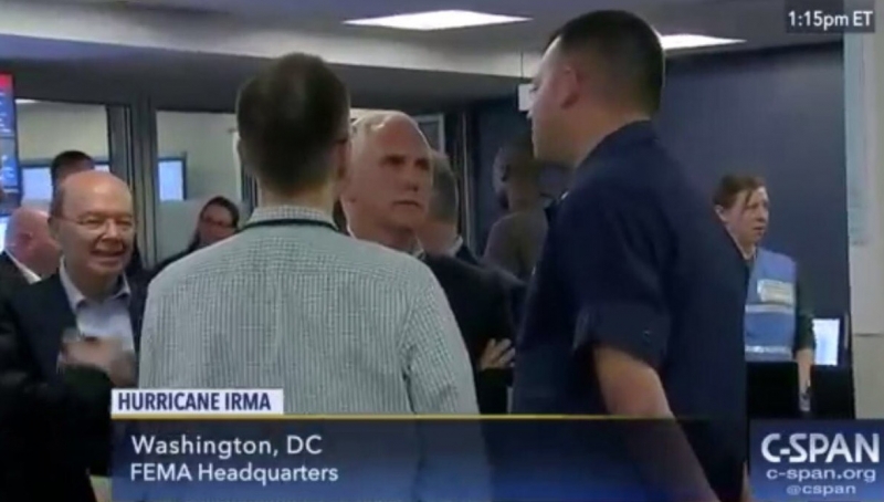 A screenshot of a C-SPAN clip showing a crowd of people.