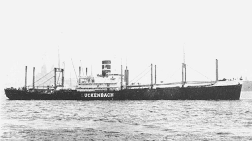 A black and white photo of a ship. 