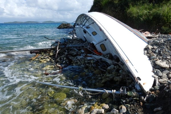 An overturned beached vessel. 