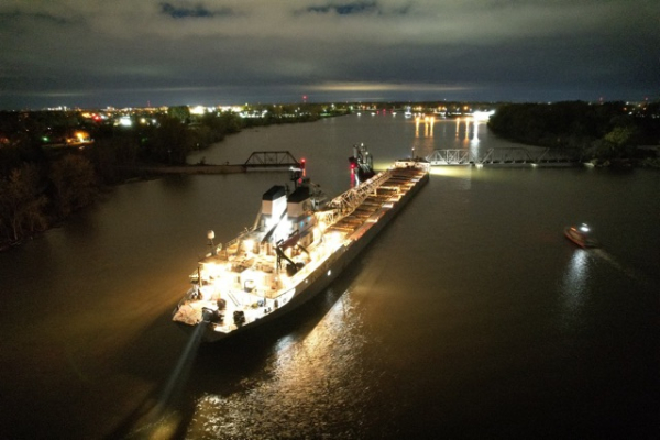 An aerial image of a vessel at night.