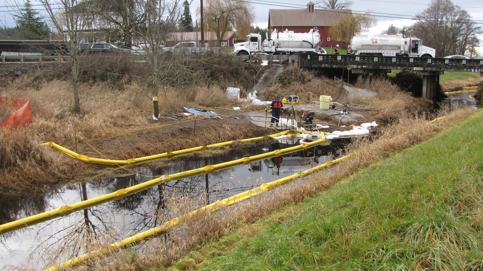 Ongoing cleanup activities of the Olympic Pipeline spill emergency response in Conway WA. View of bridge crossing SR534 looking south, December 12, 2023.