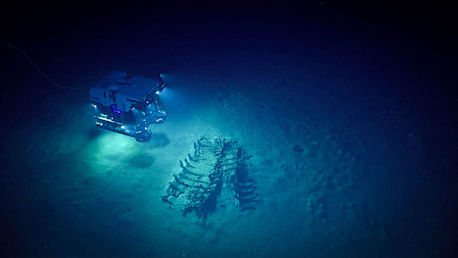 A small vessel in deep sea.