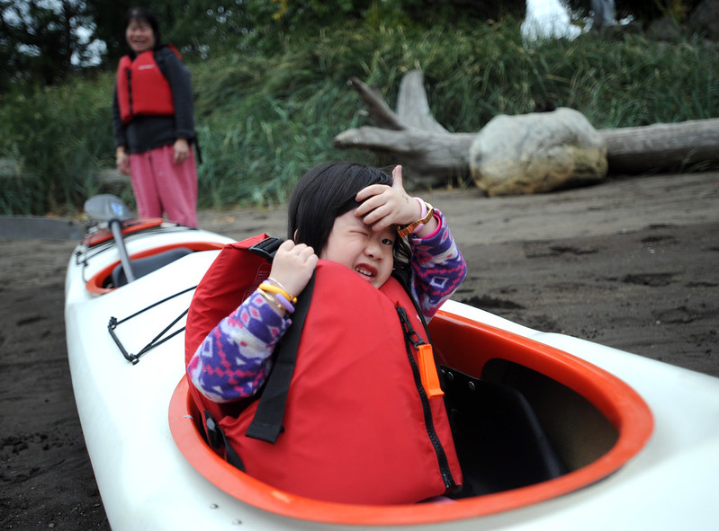 A child in a kayak.