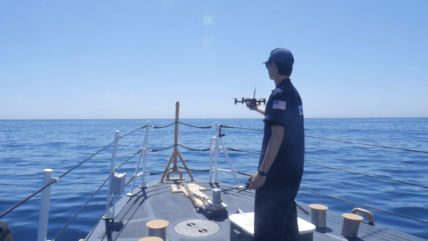 Uncrewed Aircraft Systems (UAS) Pilots fly commercial UAS (drone) as part of field tests aboard USCG Cutter Blackfin