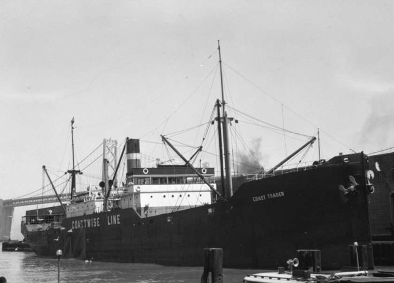 A black and white photo of the Coast Trader vessel. 
