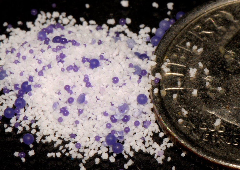 Purple and white microbeads. 