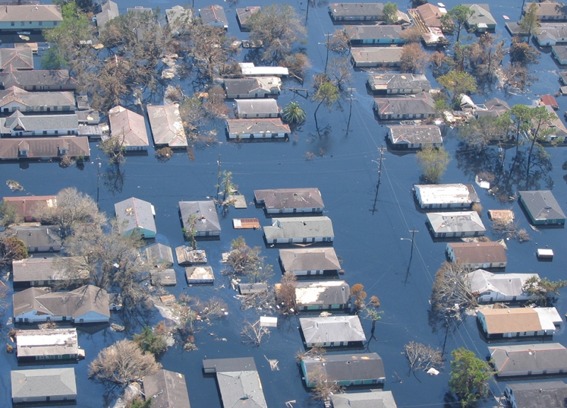 An aerial view of a flooded residential area. 