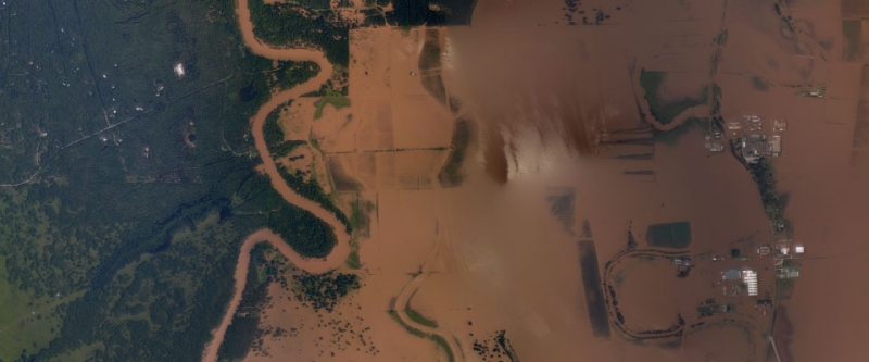 An aerial view of flooded land. 