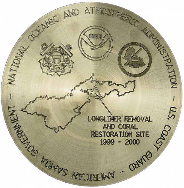 A commemorative medal that reads "National Oceanic and Atmospheric Administration. U.S. Coast Guard. American Samoa Government. Longliner Removal and Coral Restoration Site 1999-2000."