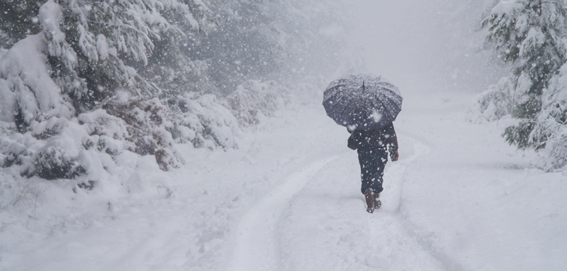 A person walking through snow. 