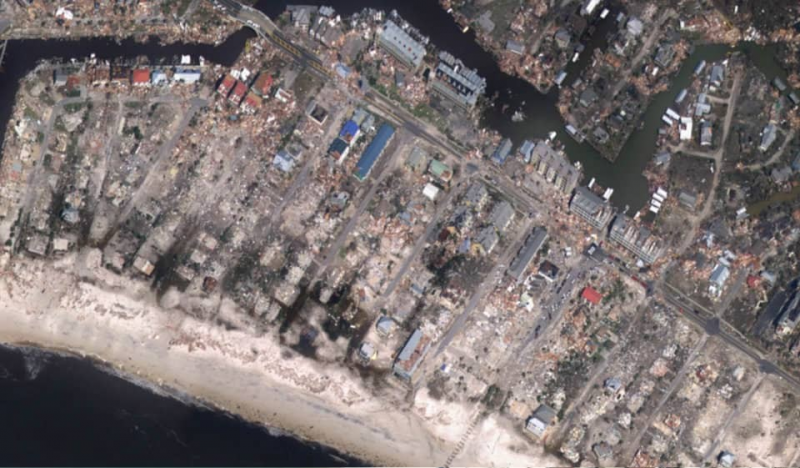 A satellite image of a coast.