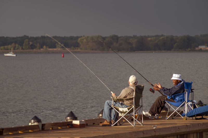 Two people fishing. 