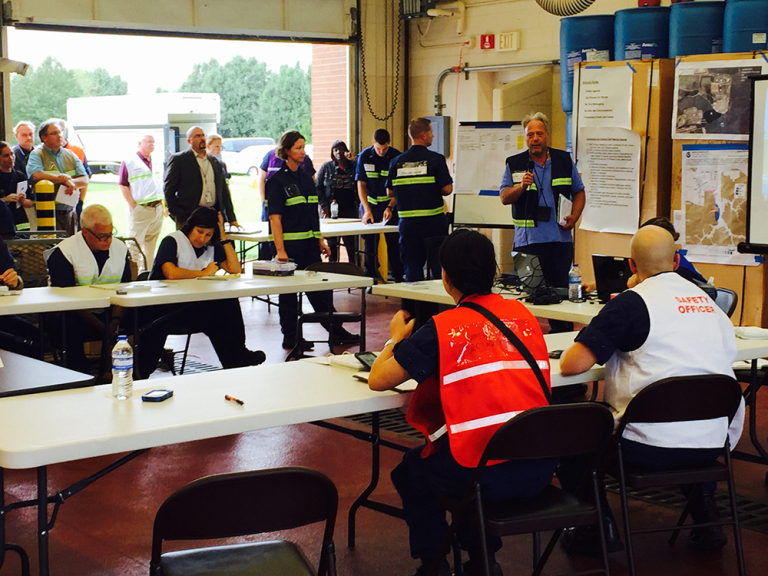 A group of people at a training exercise. 