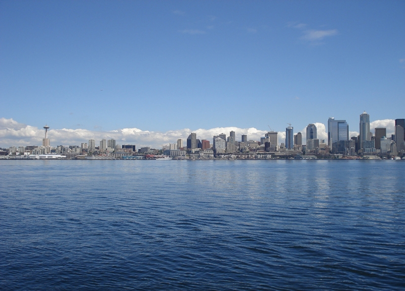 A view of the Puget Sound with the Seattle skyline in the background. 