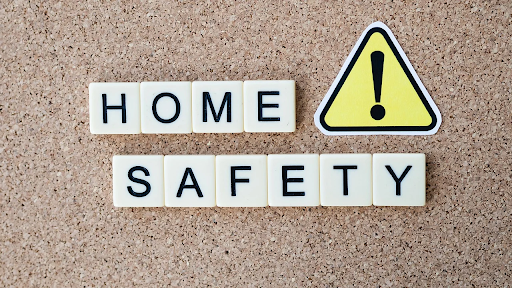 A bulletin board with letter tiles reading "Home Safety."