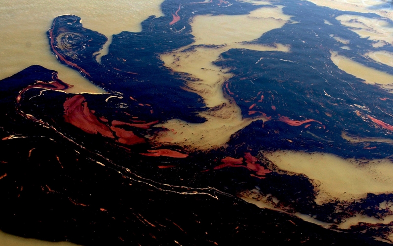 A close-up of oil in water. 