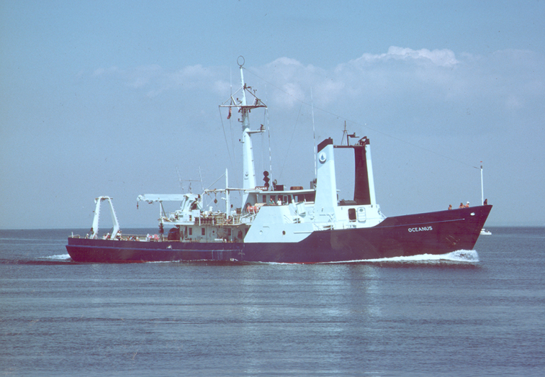 A vessel on a body of water. 