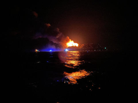 A barge on fire.