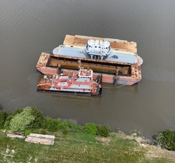 An aerial image of a vessel in water.