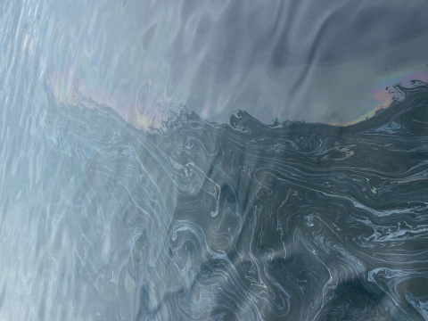 Oil sheen in water.