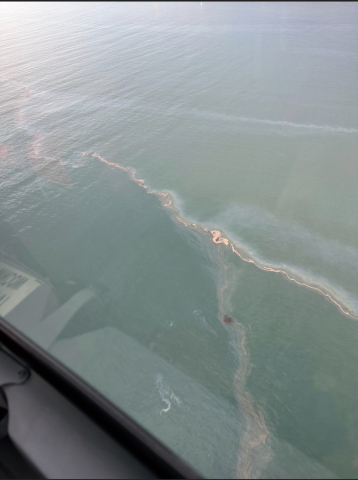 An aerial image of oil in water.