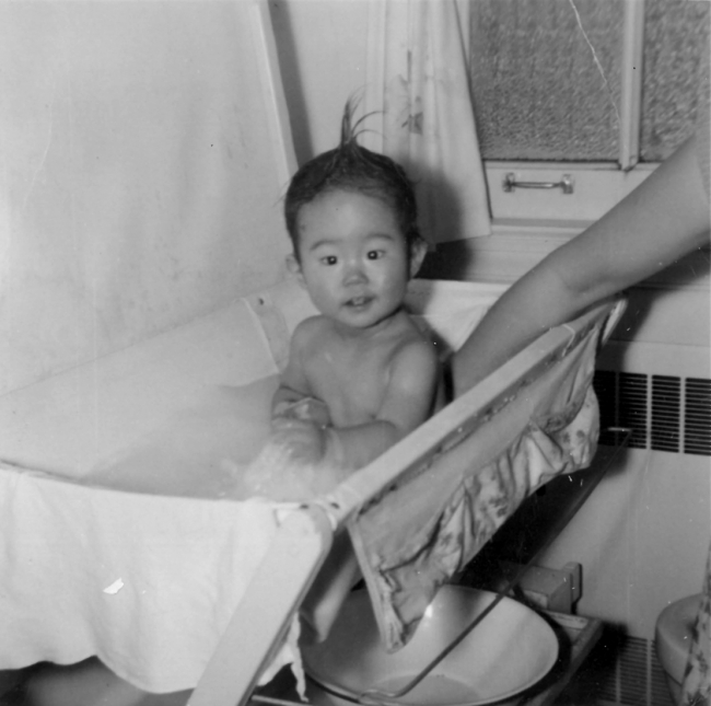 A baby in a bath.