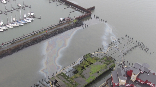  Overhead view of docks and sheen on water.