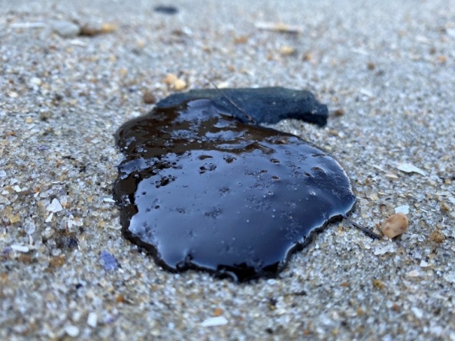 Oil on a beach.