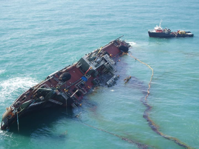 Oil coming from a sinking vessel.