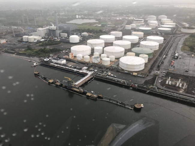 An aerial view of an industrial shoreline. 