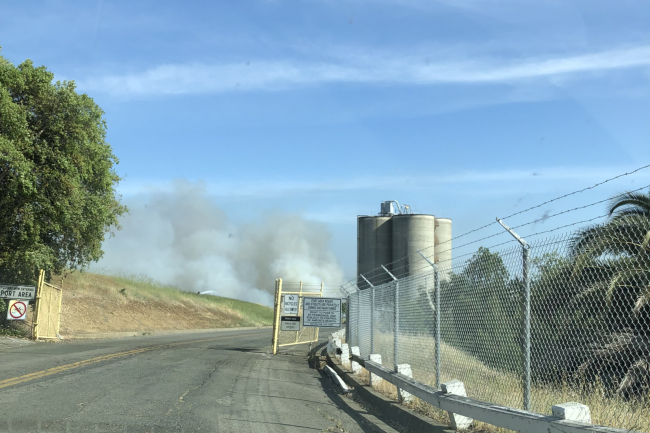 Smoke coming from an industrial site.