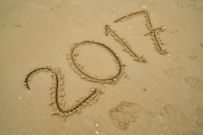 "2017" written out in the sand. 