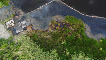 An aerial image of an oil sheen in pollution boom.