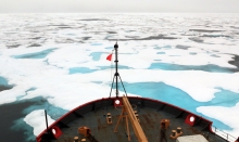 Image of an icebreaker moving through ice.