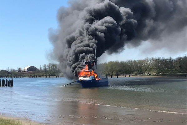 A vessel on fire.